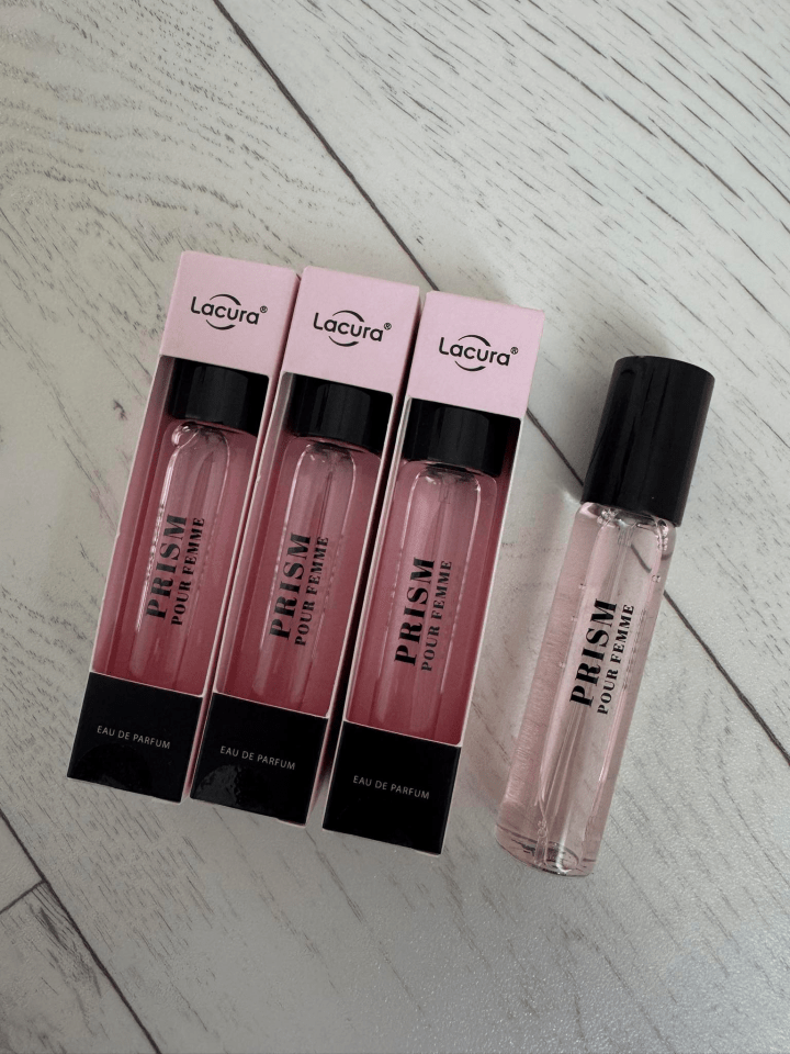 Three Lacura Prism Pour Femme Eau de Parfum bottles and one additional bottle.