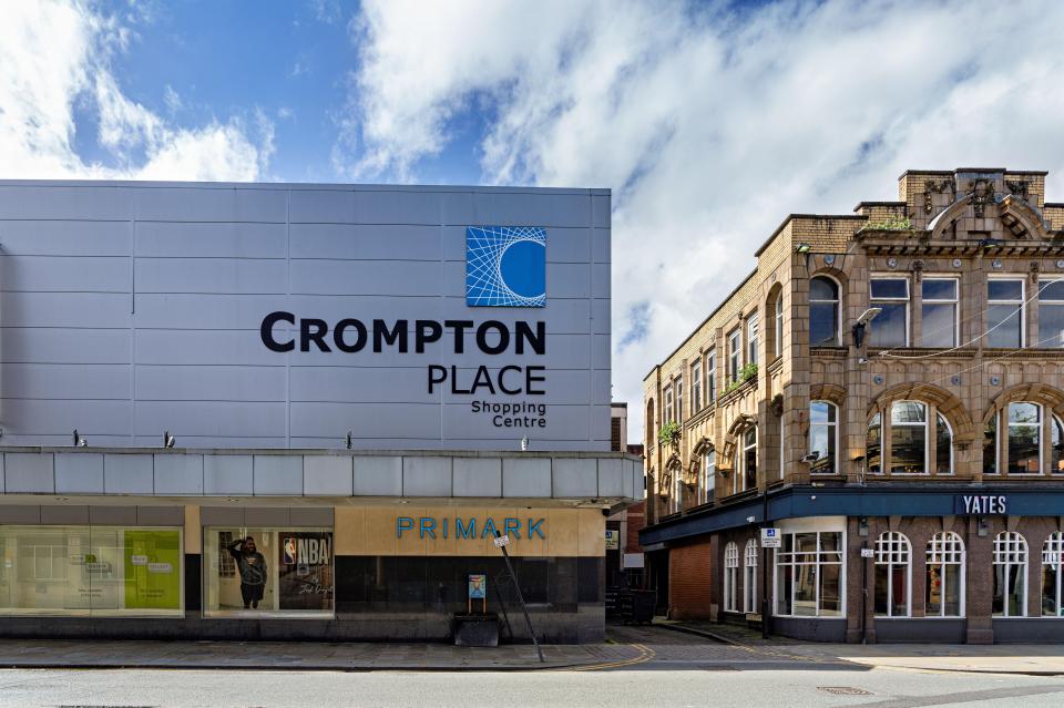 Crompton Place Shopping Centre in Bolton, UK, with a Primark and Yates's.