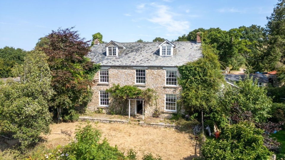 Six-bedroom farmhouse in Devon for sale.