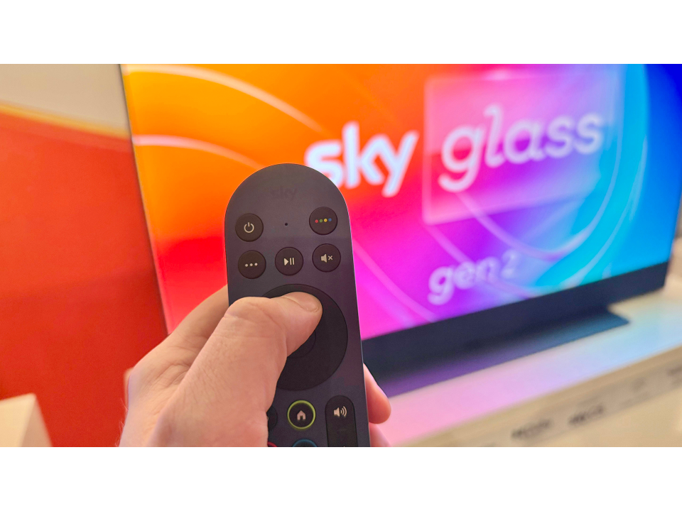 Hand holding Sky Glass Gen 2 remote.
