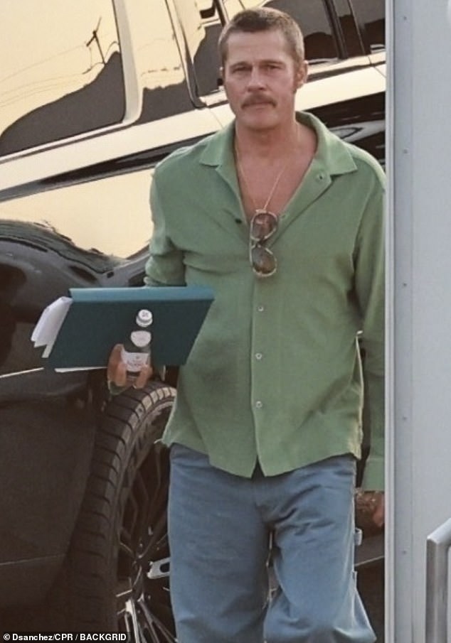 Brad Pitt, 61, looked somber as he was seen on set of his latest project The Continuing Adventures Of Cliff Booth on Tuesday in Gardena