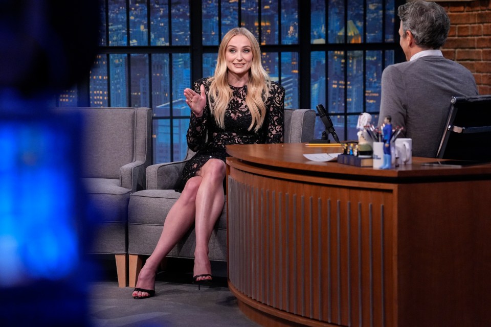 Sophie Turner being interviewed on Late Night with Seth Meyers.