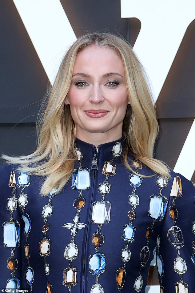 However, it now appears the Game of Thrones star is single again, with reports claiming she uploaded nine photos to her Raya profile - including holiday snaps and one of her dancing in a hotel room (pictured in May)