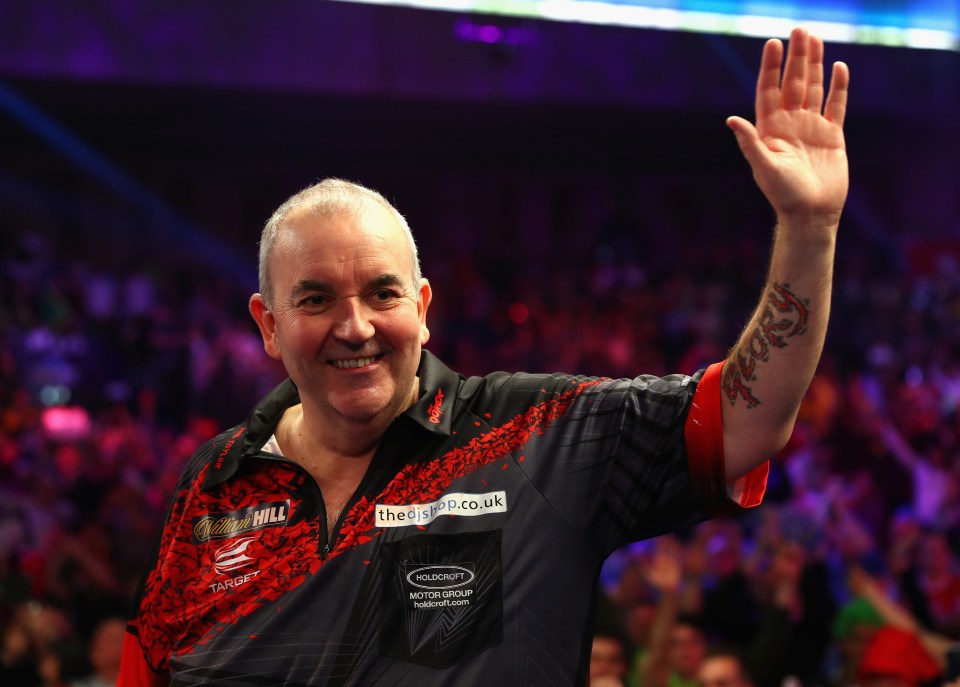 Phil Taylor acknowledges the crowd after losing the PDC World Darts Championship final.