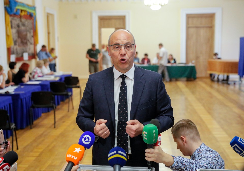 Andriy Parubiy, former speaker of the Ukrainian Parliament, speaking to the media.
