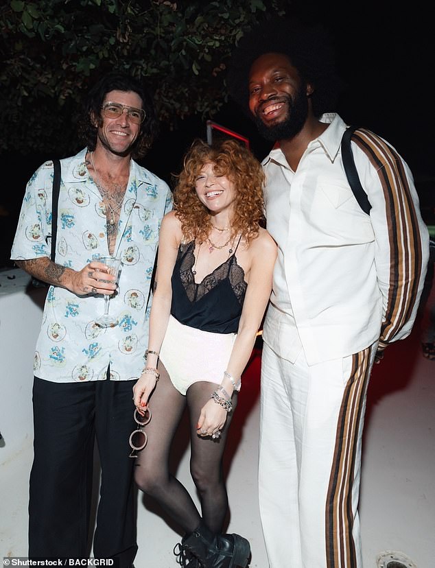Natasha Lyonne turned heads in a black top and white short shorts which she wore with dark tights