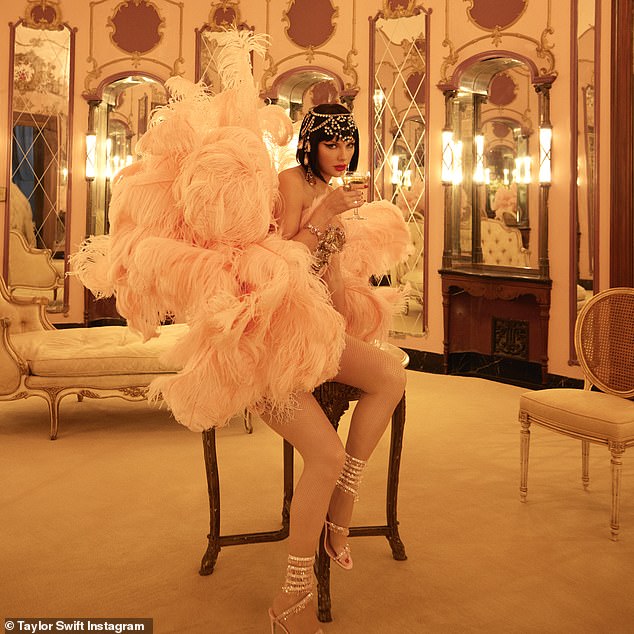 And during the New Heights podcast, Taylor shared her new album artwork where she sizzled in a racy feathered number and black bobbed wig as she posed in a mirrored room