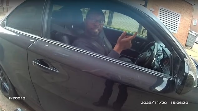 Bodycam footage of a driver reacting angrily after receiving a parking ticket.