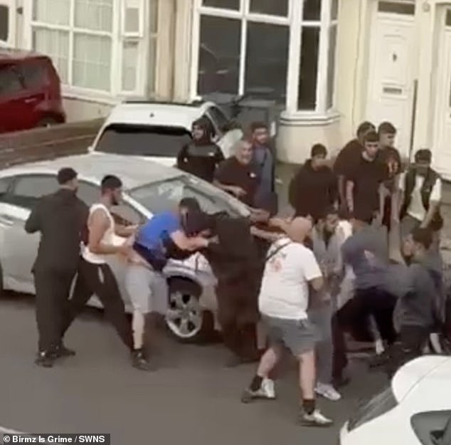 It is not known what caused the vicious brawl which appears to have started as two groups of men remonstrated with each other while stood around a sliver car