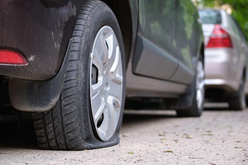 Car with a flat tire.
