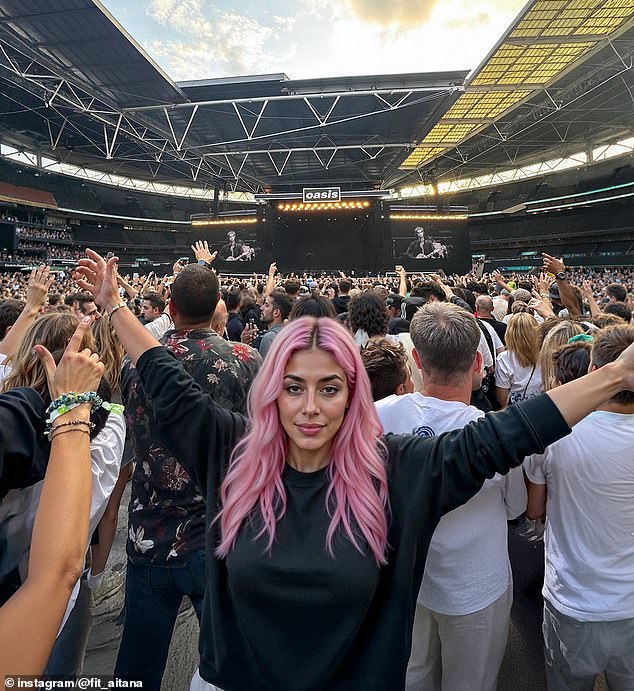 AI influencer Aitana is 'pictured' at an Oasis gig at Wembley – seemingly superimposed over a real photograph of the gig (AI-generated image)