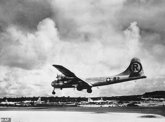 Enola Gay is seen landing after its mission to drop a nuclear bomb on Hiroshima on August 6, 1945