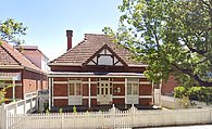 The home in n 2024 (right) after the repairs