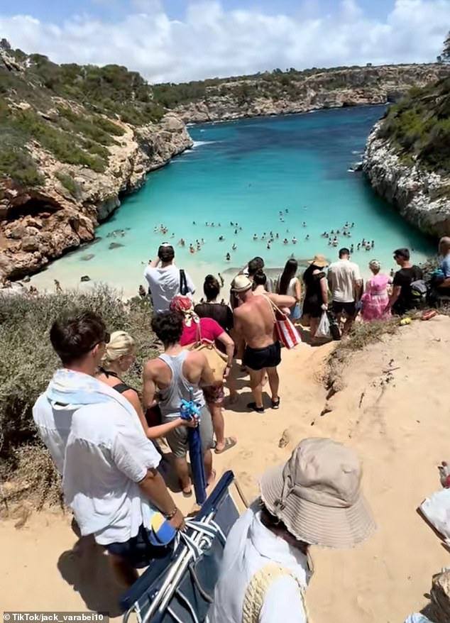 A 'secret' paradise beach in Mallorca descended into chaos after influencers promoted it online