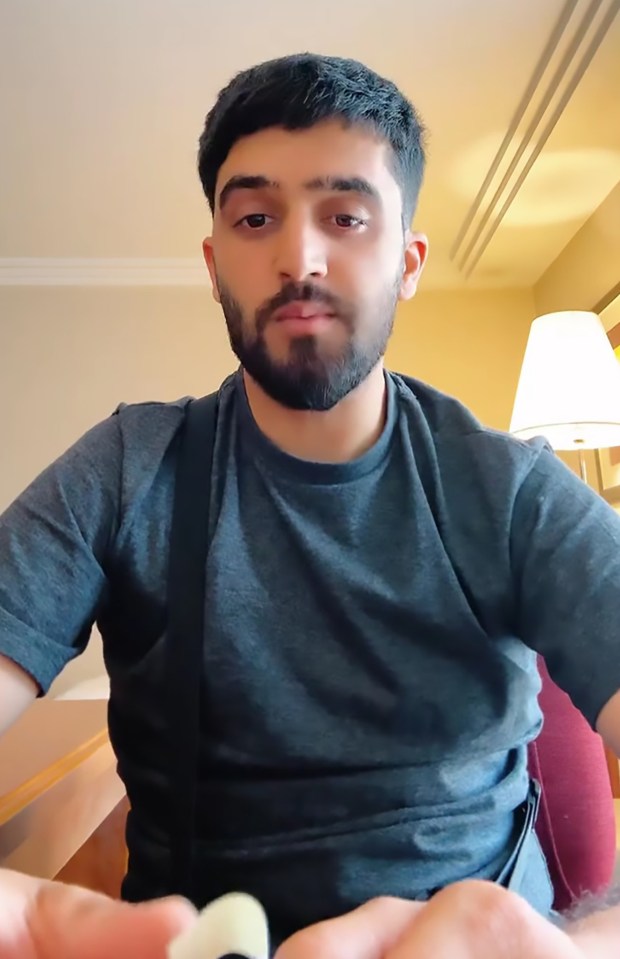 Man livestreaming on TikTok.