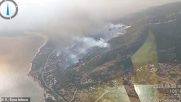Multiple aircraft have been roped in to tackle the inferno, which took hold in Cadiz in Andalusia on Tuesday afternoon