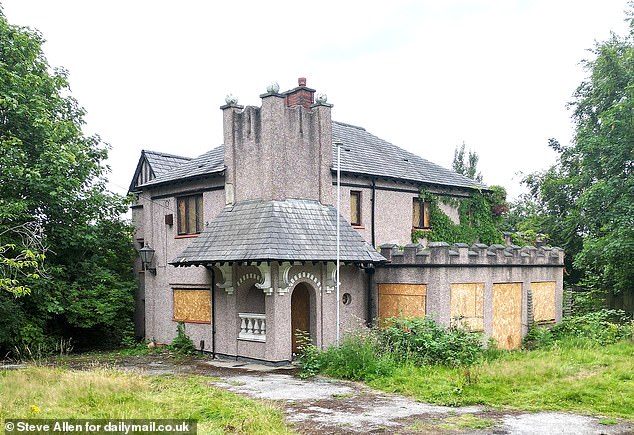 AFTER: Just off a bustling main road in Leigh, a house rots in isolation, its eye-catching design the only clue to what it once contained