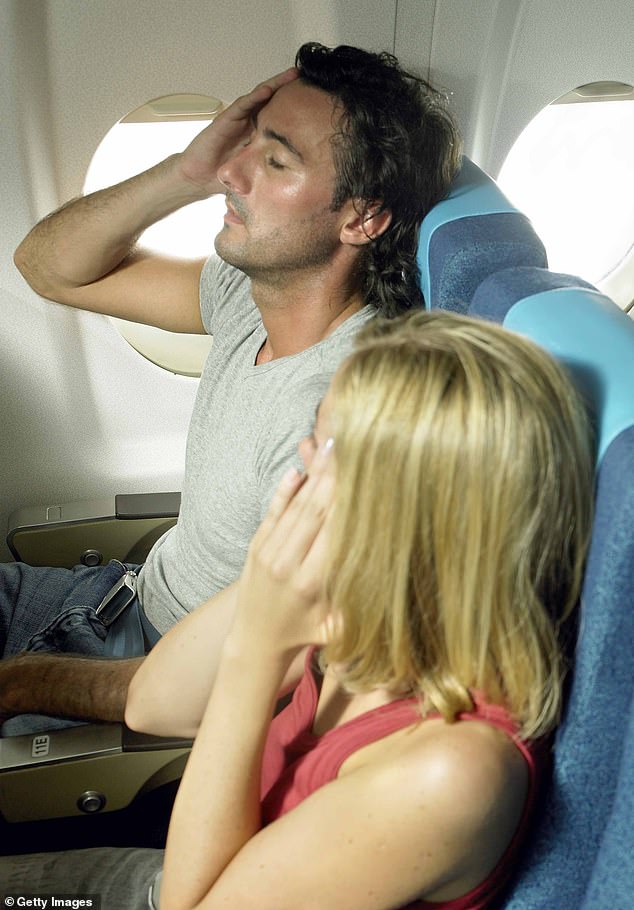 While sitting next to a crying baby can ruin your trip, there are strategies that can be employed to reduce the risk of being near the child (stock image)