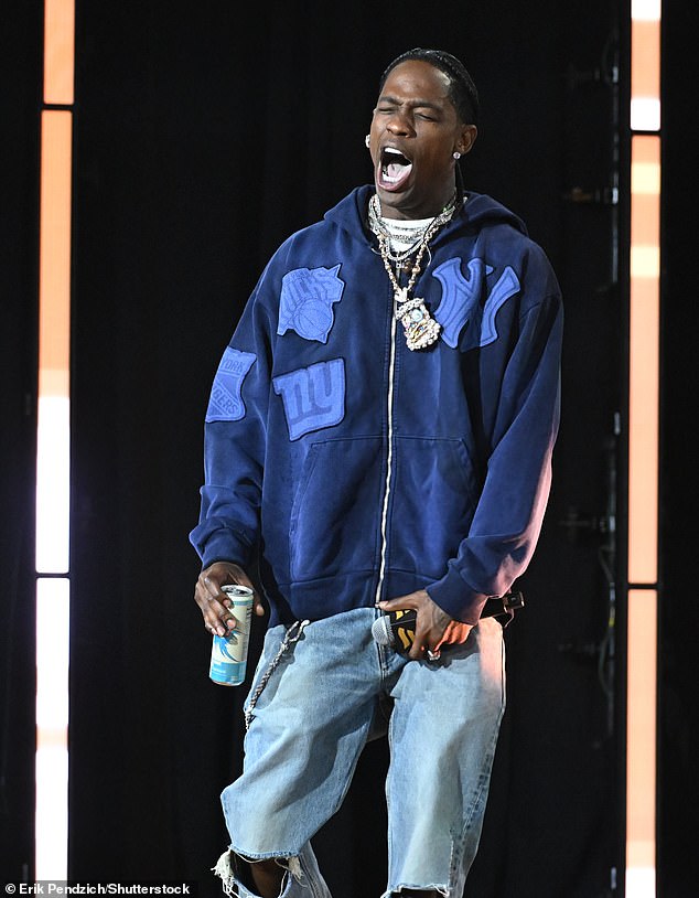 Travis Scott's (pictured) music video set in London was allegedly targeted by a man who threatened to stab a member a crew