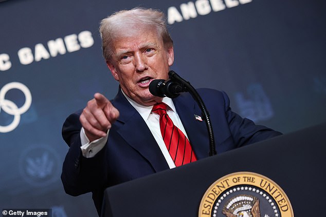 U.S. President Donald Trump takes questions from reporters about his desire to takeover Washington, DC