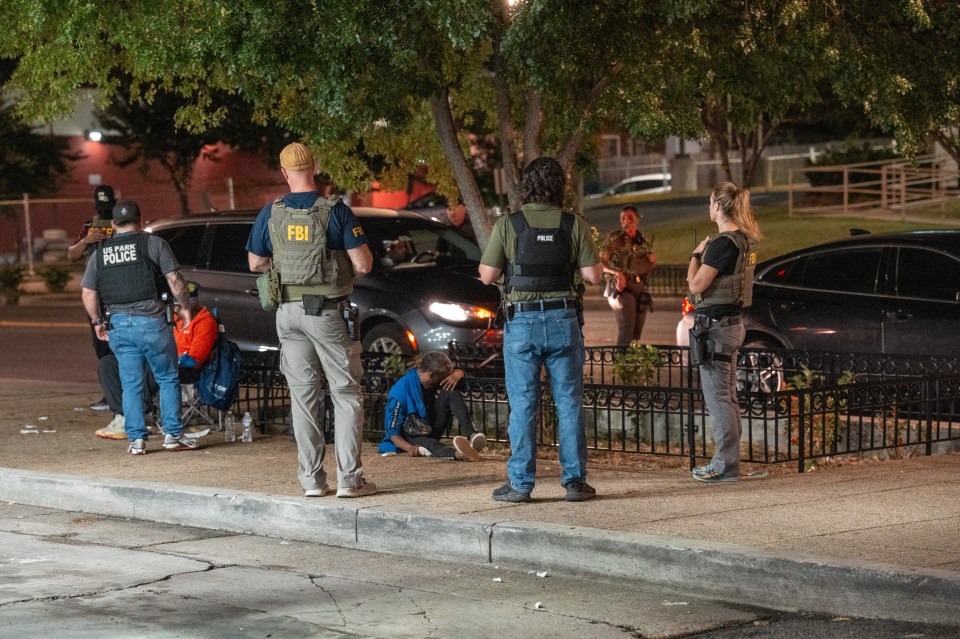 FBI, ATF, and U.S. Park Police officers assisting a woman experiencing apparent synthetic marijuana side effects.