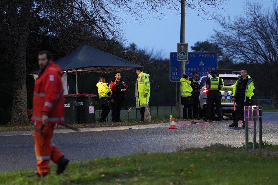 Police officers at a crime scene.