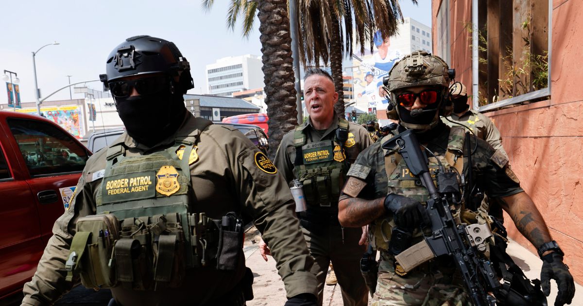 Gregory Bovino, chief patrol agent of the El Centro Sector and Commander-Operation At Large CA, marches with federal agents to the Edward R. Roybal Federal Building after U.S. Border Patrol agents produced a show of force outside the Japanese American National Museum on Aug. 14, 2025, in Los Angeles, California.