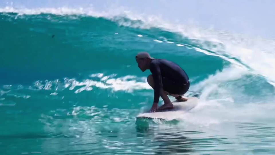 Prince Harry surfing.