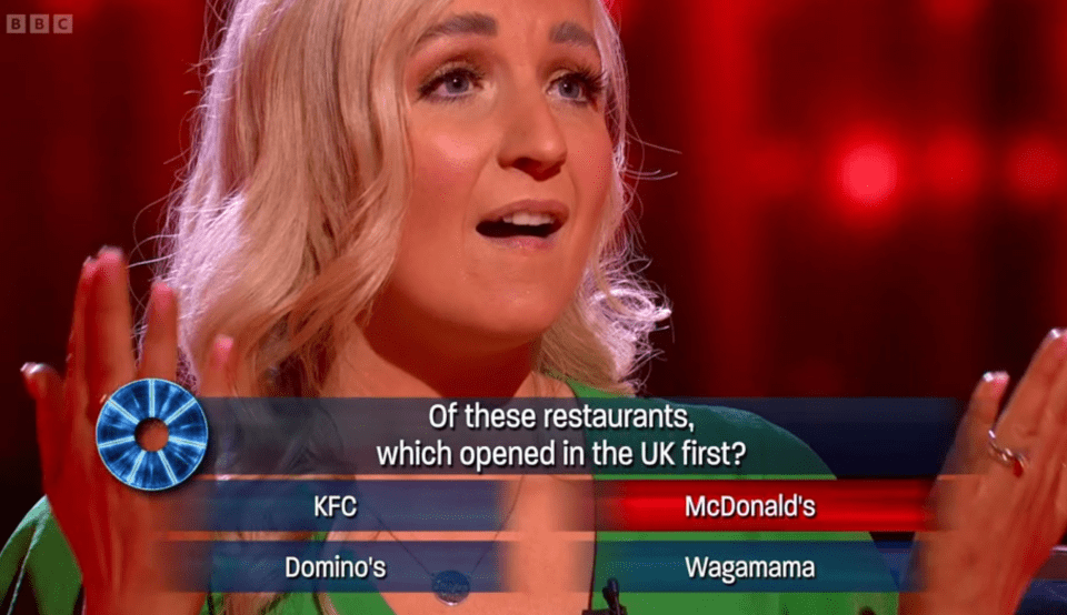 A contestant on a game show answers a question about which restaurant opened first in the UK.