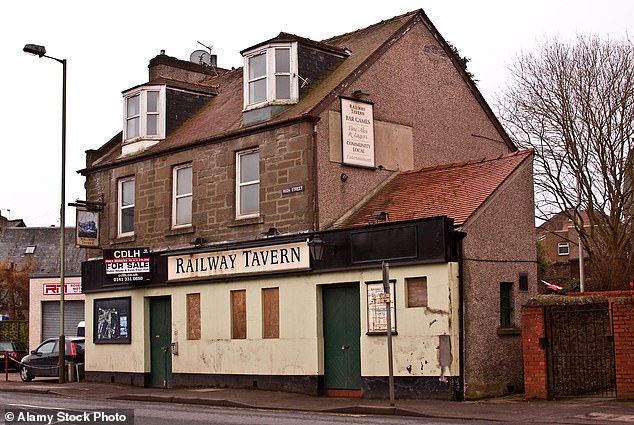 A boarded-up pub is emblematic of Dundee's decline since its industrial heyday