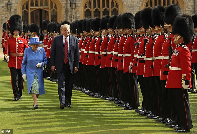 Queen Elizabeth and Donald Trump are pictured inspecting the Guard of Honor at Windsor Castle in July 2018