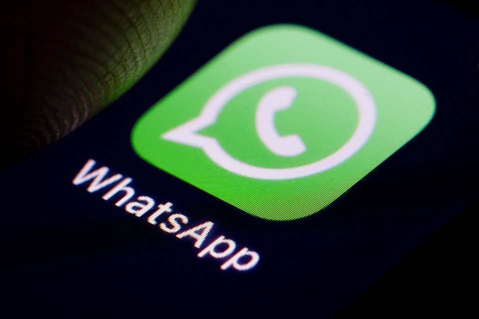 WhatsApp logo on a smartphone screen.