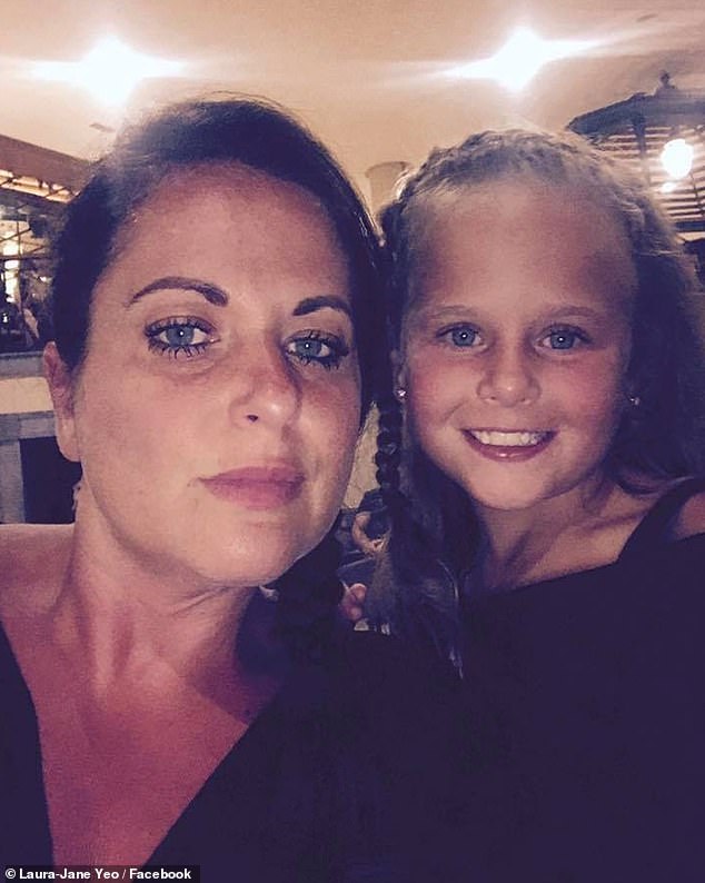Laura-Jane Yeo from Barkingside, east London, was horrified to watch a pair of dolphins 'dragging' her daughter, Lexi Yeo, underwater in the sea pen