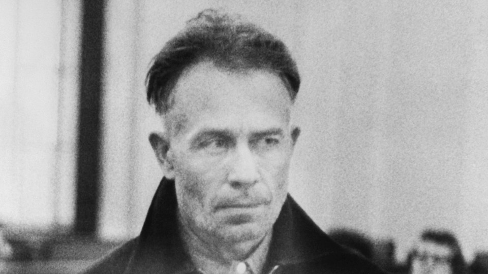 Black and white photo of Ed Gein.