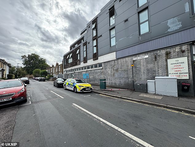 A murder investigation is underway after a 29-year-old woman was knifed to death in her London home. Pictured: A police cordon has been put in place following the stabbing in Greenwich