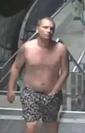 CCTV image of a shirtless man in patterned shorts, wanted in connection with a sexual assault.