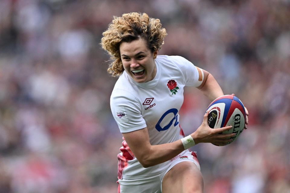 (FILES) England's full-back Ellie Kildunne celebrates after scoring a try during the Six Nations international women's rugby union match between England and Ireland at Twickenham in south-west London on April 20, 2024. The Women's Rugby World Cup, which kicks off on August 22, 2025 in England, is an opportunity for many players to shine, including some who come directly from rugby sevens after competing in the 2024 Olympics in Paris. (Photo by JUSTIN TALLIS / AFP) (Photo by JUSTIN TALLIS/AFP via Getty Images)