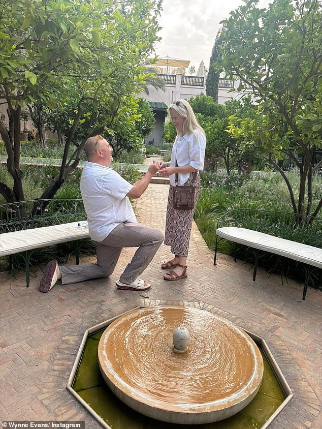 Wynne got down on one knee during a romantic trip to Morocco in June and documented the gesture on Instagram (pictured)