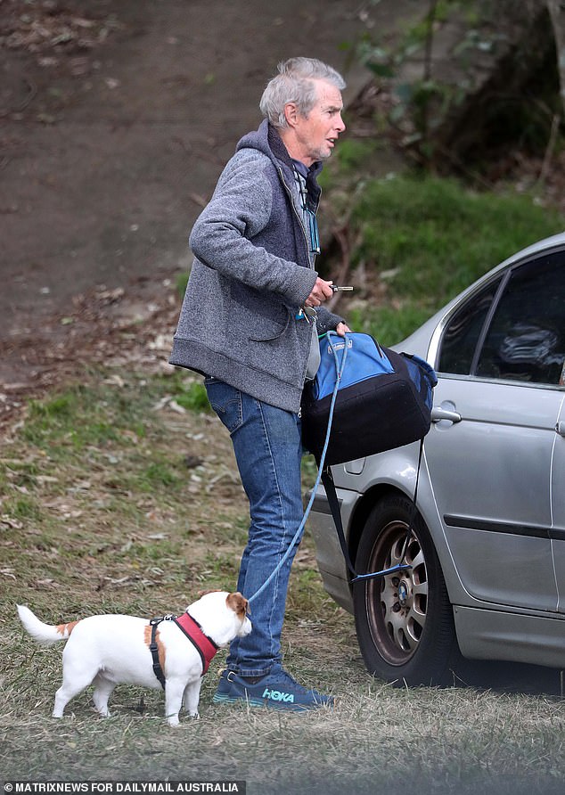 Yahoo is believed to only have his dilapidated BMW to shelter himself and dog Jingle