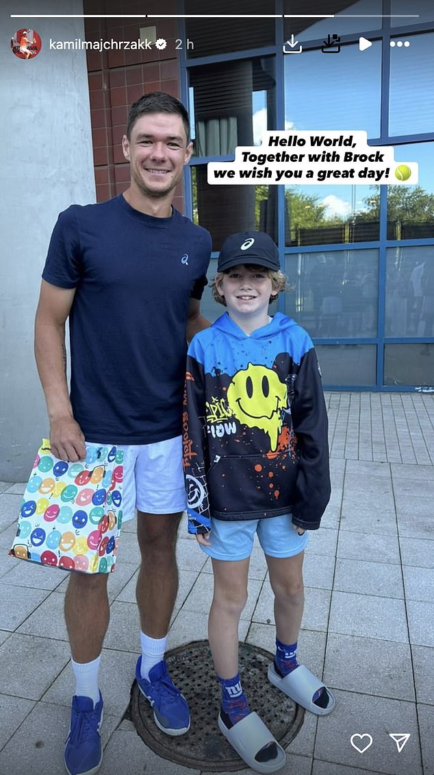 Kamil Majchrzak has been reunited with the young boy who had a souvenir cap snatched away