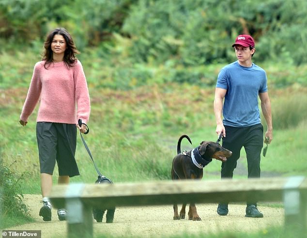Zendaya flashed her dazzling $200k engagement ring during a low-key stroll with her fiancé Tom Holland in Richmond Park on Saturday