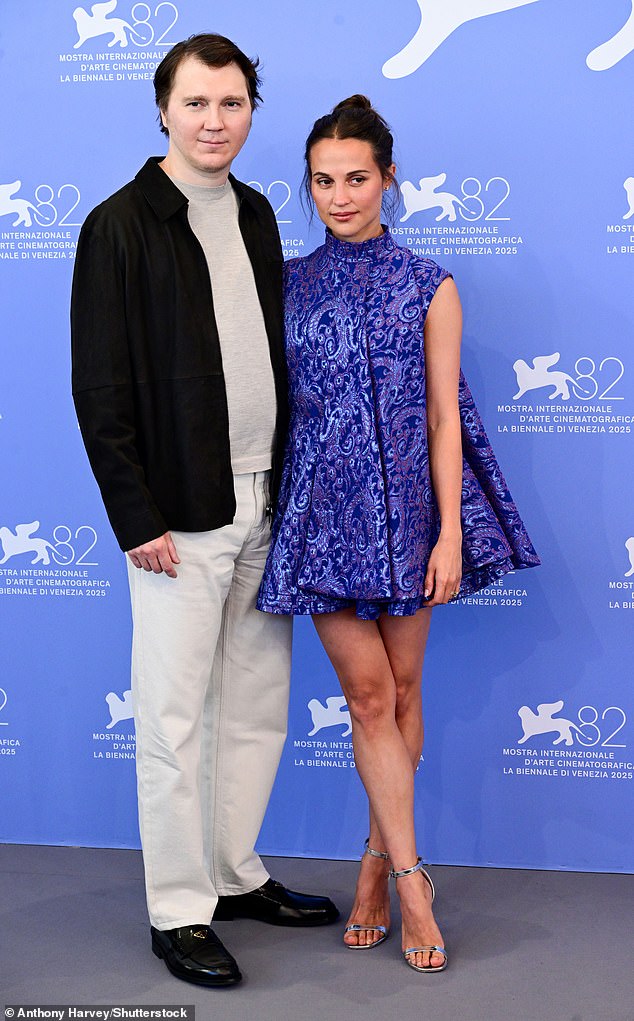 She completed the look with silver heels as she was seen posing for snaps with her co-star Paul Dano
