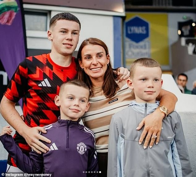 Kai with his mum Coleen and brothers Kit and Klay