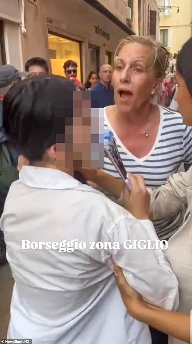 Footage of the incident, which took place earlier this month in the Santa Maria del Giglio area of Venice, shows a furious Christina Cadieu Greene gripping a 14-year-old's hair
