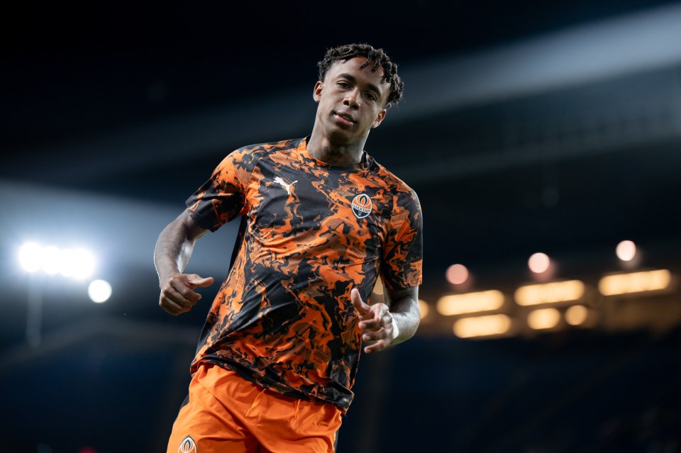Soccer player warming up before a game.