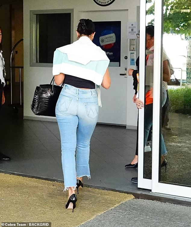She was flaunting her incredible figure as she departed the city