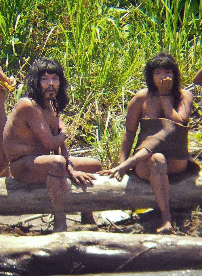 Uncontacted Mashco-Piro couple in the Peruvian Amazon.