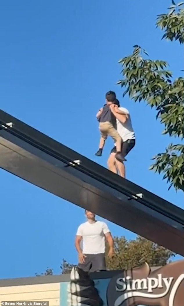 Sampson said he could tell the little boy felt 'relief as soon as he got into my arms'