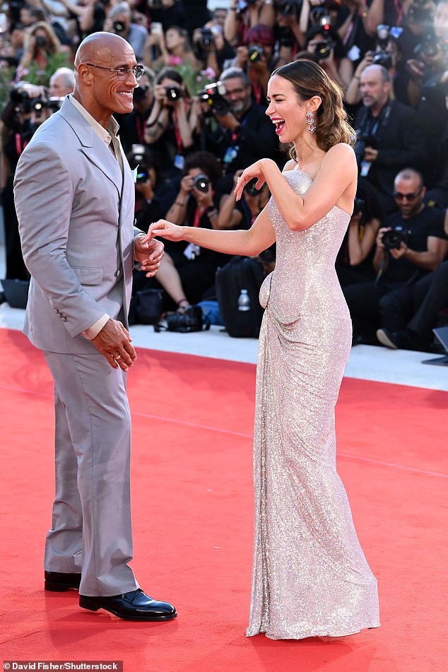 Emily and Dwayne beamed as they chatted away on the red carpet