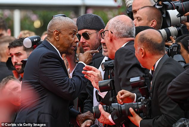 The iconic actor, 70, was filmed pointing his finger in the face of one of the snappers and shouting 'Stop it!' during the dramatic exchange which was captured on video